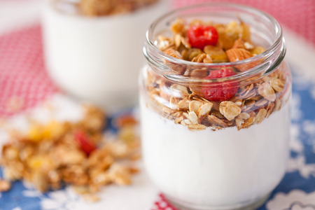 delicious and healthy yogurt and granola, fruits, nuts, grainsの写真素材