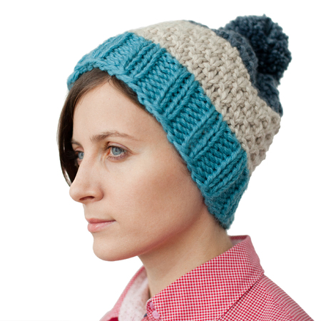 Pretty young woman wearing a knitting hatの写真素材