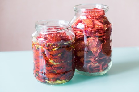 Sun dried tomatoes with herbs and sea salt in olive oilの写真素材
