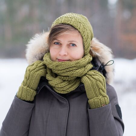 Pretty young woman wearing a knitting hatの写真素材
