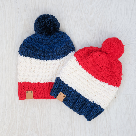 cozy knitted children set of hatsの写真素材