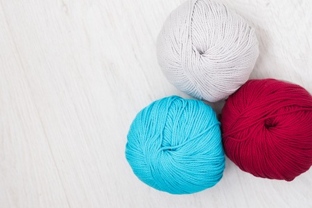 Colorful wool yarn ballsの写真素材