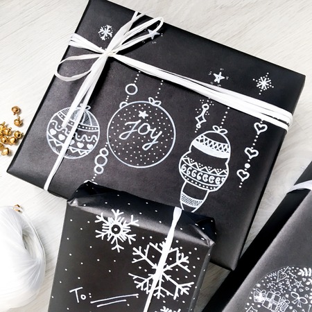 square boxes of different sizes wrapped gifts ribbonsの写真素材