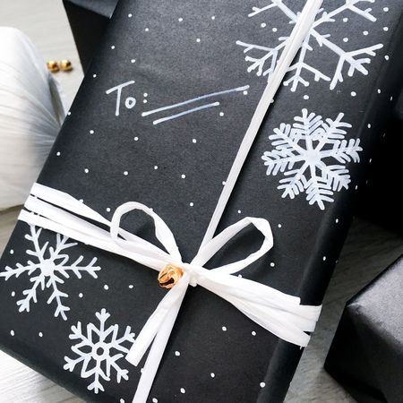 square boxes of different sizes wrapped gifts ribbonsの写真素材