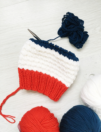 tangles with a knitting thread on a tableの写真素材