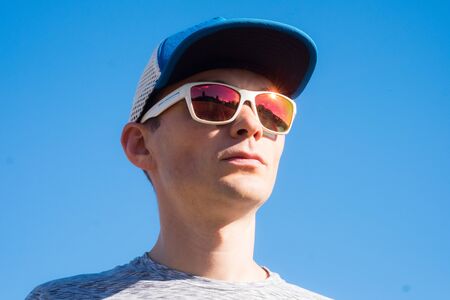 Handsome cool young man with sunglassesの写真素材