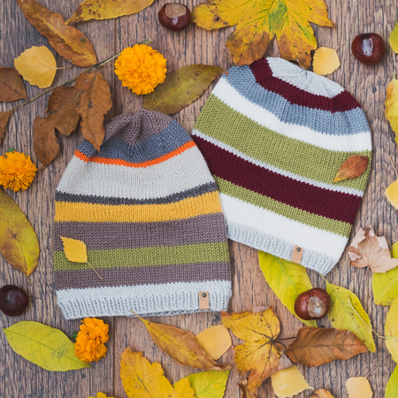 cute cozy knitted children set hatsの写真素材