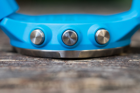 Close up of button runner wearing sport smart watchの写真素材
