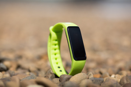 Close up of Fitness tracker runner wearing sport smart watchの写真素材