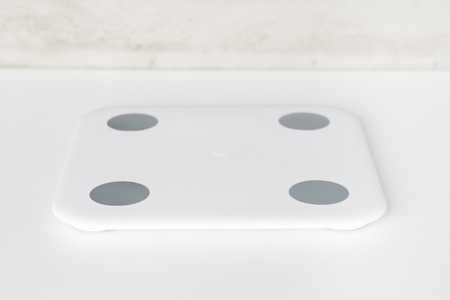 Kitchen scale over white backgroundの写真素材