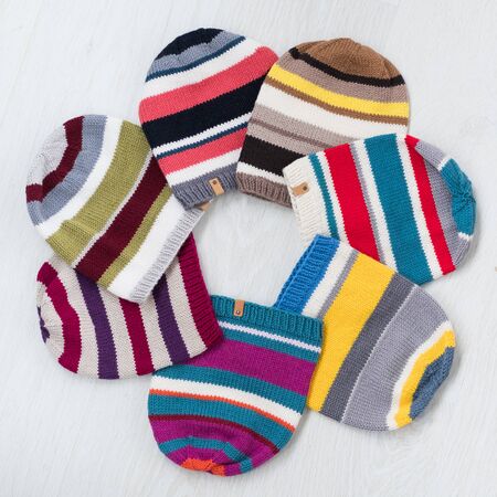 cute cozy knitted children set hatsの写真素材