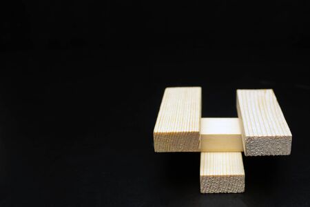 ne-on-one wood blocks on a black background