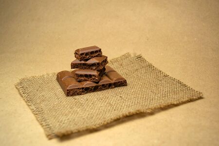 Milk porous chocolate on a napkinの写真素材