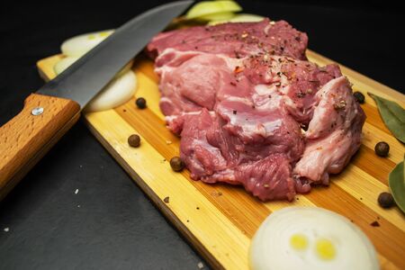 Fresh juicy meat on a cutting boardの写真素材