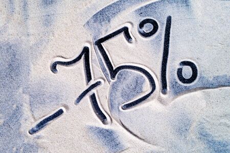 Drawing on the sea sand -75 percent discountの写真素材