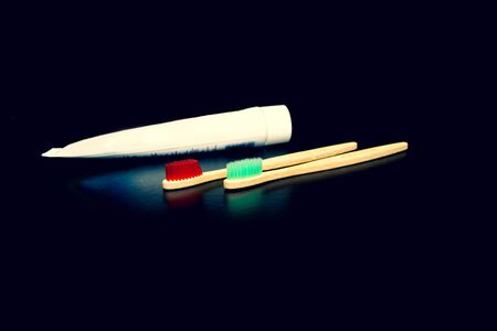 Dental and oral care products. Hygiene of teeth and oral cavity. Wooden Toothbrushes and Toothpaste