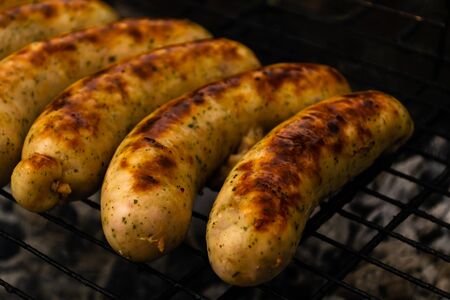 Grilled sausages. Ingredients for a hot dog.の写真素材