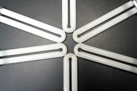 fluorescent lamps on a black background lamps for drying gel polishの写真素材