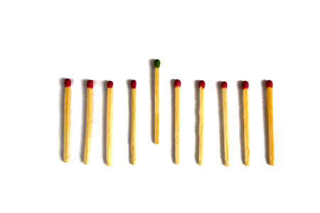 Matches folded in a row, one stands out isolated on white background
