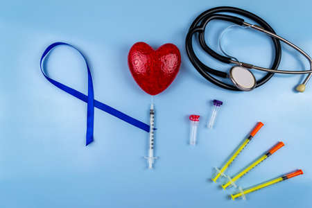 Stethoscope and insulin syringes, world diabetes day conceptの写真素材