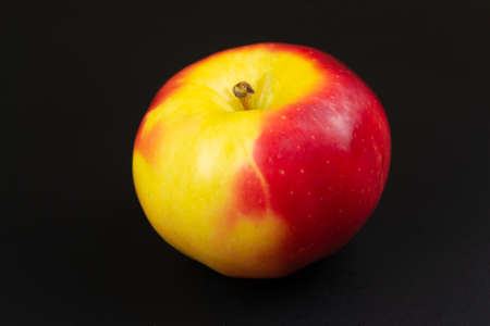 Red apple on a black background apple in the dark,の写真素材