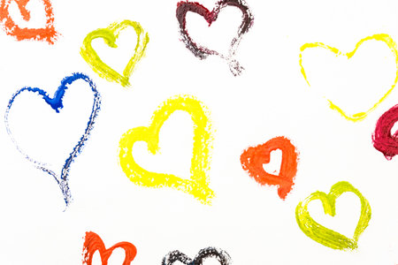 Close-up of bright hearts painted with paints on a white background. Valentine's day cardの写真素材