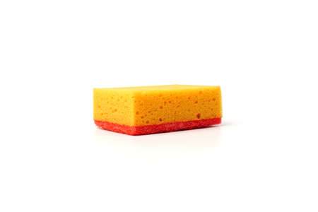 Kitchen sponge isolated on white background. Clean dishes in the kitchenの写真素材
