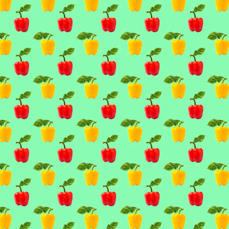 Seamless food pattern. Red and yellow sweet bell peppers on a green background. Organic vegetables, healthy ingredient. Bulgarian pepper.の写真素材