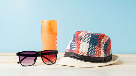 summer background. summer vacation relaxation background theme. checkered summer hat, sunglasses,...