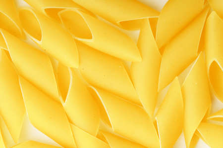 raw foam pasta background. flour products. edible background