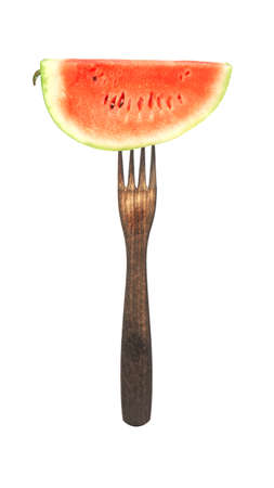 slice of watermelon on a fork isolated on white background.の写真素材