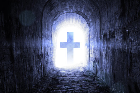 cross at the end of the tunnel. tunnel after death and demiseの写真素材