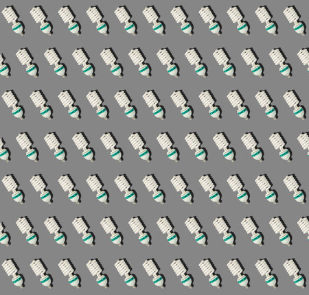 spiral light bulb pattern on gray background