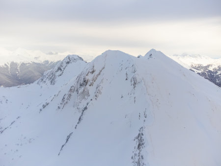 A view of the snowy peak of a mountain in Sochiの写真素材