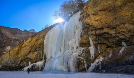 FROZEN WATERFALL AT NERAK DURING CHADAR TREKの写真素材