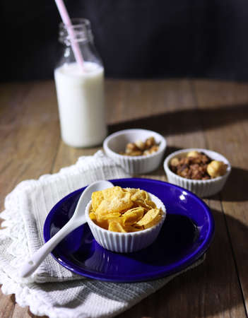 healthy breakfast with cornflakes and dried fruitの写真素材