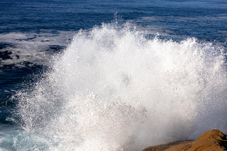 wave break mediterranean sea tuscany coastの写真素材