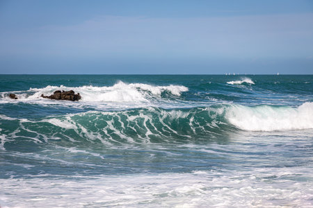 Beautiful view of the sea and the waves in the foreground.の写真素材