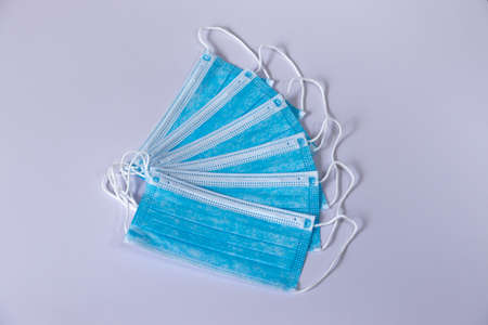Surgical protective Face Masks spreads spiral white backgroundの写真素材
