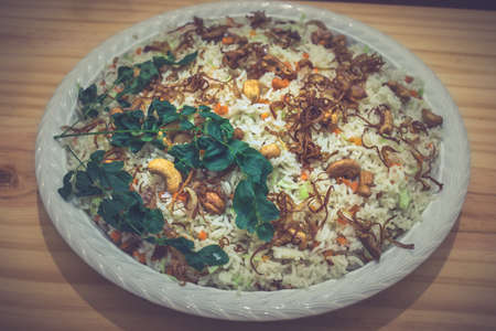 Basmati fried rice plate on a dinner tableの写真素材