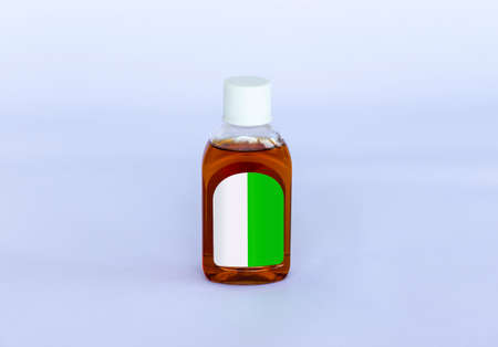 Small isolated Antiseptic Liquid bottle on a neutral backgroundの写真素材