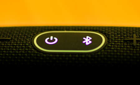 Galle, Sri Lanka - 02 19 2021: On-off and Bluetooth buttons on the portable and waterproof JBL charge 4 boom box close up. excellent rugged build quality for last long and hard use.のeditorial素材