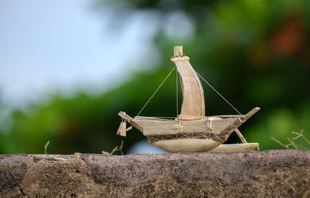 Handmade small traditional wooden boat showcase at Galle fort. miniature woodwork souvenirs.