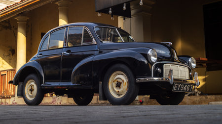 Vintage Morris minor car low angle shot, showcase in the streets of Galle Dutch fort.