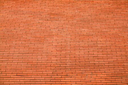background or pattern of a big red orange brick wallの写真素材