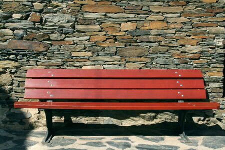 stone wall, red bank, stone floor, relax on a sunny dayの写真素材