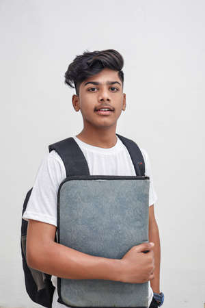 Young Indian college boy Showing Direction With Hand