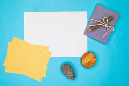 Empty yellow and white sheets for copying text at the workplace. top view or blank pages, educational or learning workspace conceptの写真素材