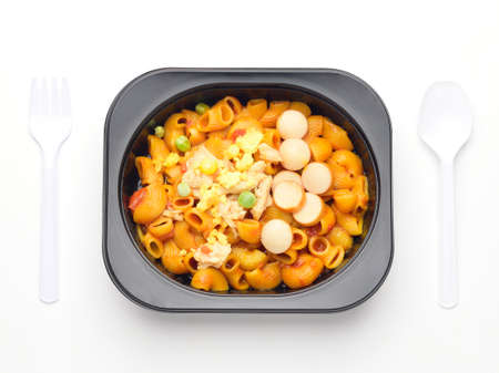 Stir macaroni in a lunchbox,Fastfood eat that much.の写真素材
