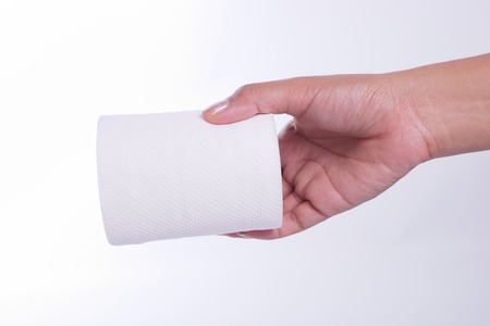 Hand-picked a white toilet paper.の写真素材